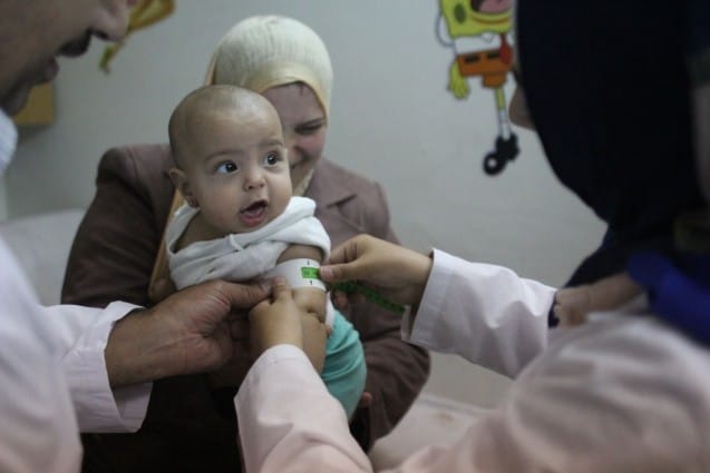 Damascus - "I am proud of my baby girl and myself. We just got her nutritional screening and she is healthy" Rudaina [NAME CHANGED] told us with excitement.  "It's because I have been breastfeeding her for the past seven months" the mother added.  Rudania, a mother of three fled her home  in eastern Aleppo two years ago. A few months later she got pregnant with her third girl. She now lives in a rented apartment in one of Damascus's impoverished neighborhoods. Today she visited a UNICEF supported nutrition centre where health workers are trained to screen the nutritional status of children.  The mid arm circumference measurement tape on  Rudaina's seven- month old baby girl, Tala points on the green cutoff, indicating the child is well nourished.   This brought a nice smile on Rudaina's face. The doctor encouraged her to continue breastfeeding and explained what other food she can add to the baby's diet.  With the support of several donors including the United Arab Emirates, UNICEF supports 60 nutrition centres across Syria.  Mothers and caregivers who come to these centres receive information sessions on breastfeeding especially in the time of stress and crisis. "It's not easy to live normally when you are displaced. Everything has changed for us even the food I get as a mother but I still believe God's will is protecting us" the mother said.   Here, at the Syrian Family Planning Association a local NGO which runs the nutrition centre, over 3,000 children were screened for malnutrition between February to July, 160 of those children were identified as malnourished. "All those cases are being followed up and treated according to Community Management of Acute Malnutrition- protocol" Siham Mousa the project coordinator from SFPA confirms.  Most of the malnutrition cases are amongst children who recently arrived to Damascus from locations across Syria where conflict has been the heaviest. The United Nations estimates that more than 400,000 Syrians live in besieged l